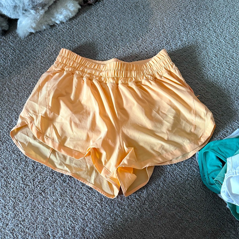 Lululemon Track That HighRise Lined Short 3” SZ 10 in Summer Glow (neon orange)
